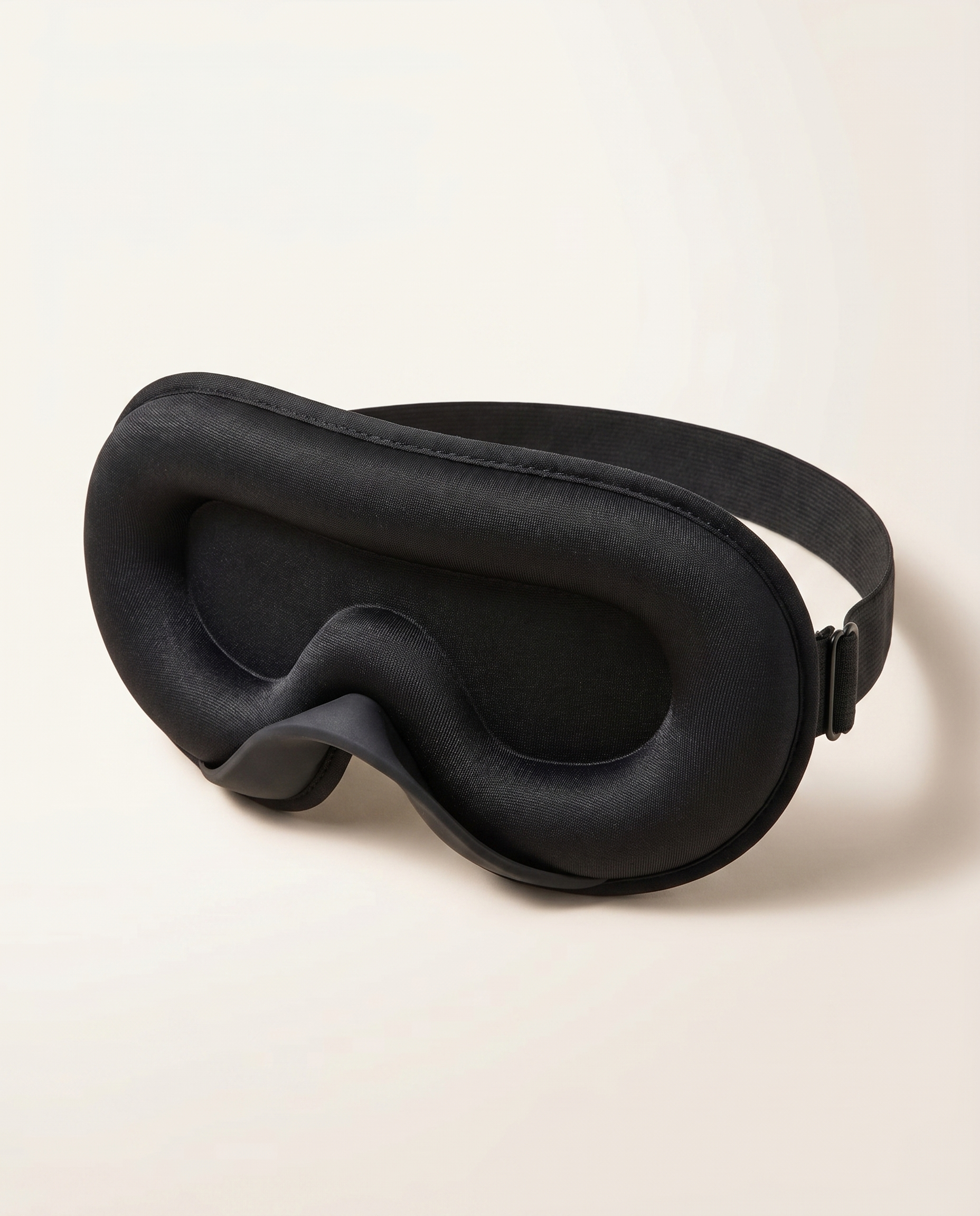 Somnia Sable 3D contour sleep mask in Jet black - front view with adjustable strap