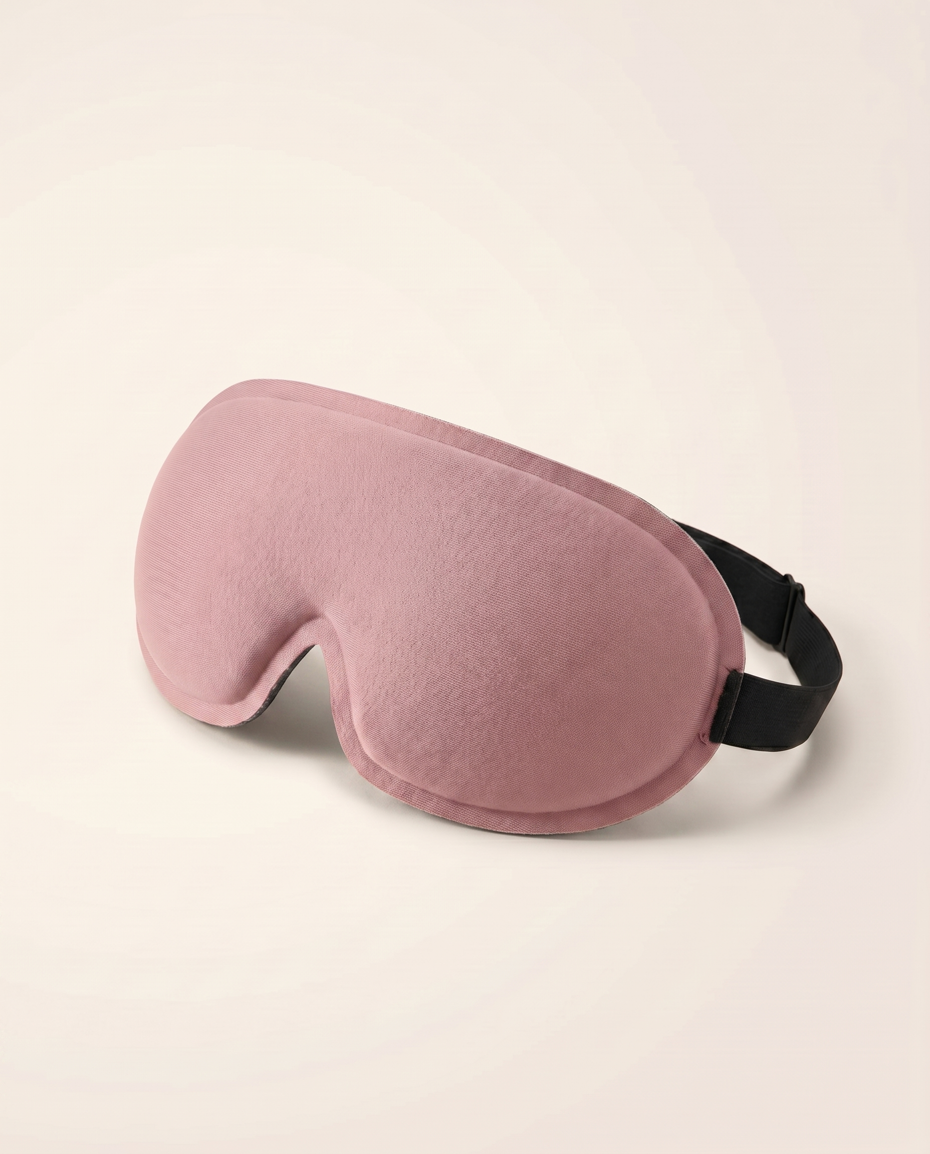 Somnia Sable 3D contour sleep mask in Heather pink - front three-quarter view, breathable ice silk