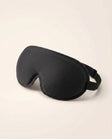 Somnia Sable 3D contour sleep mask in Jet black, three-quarter view with adjustable strap