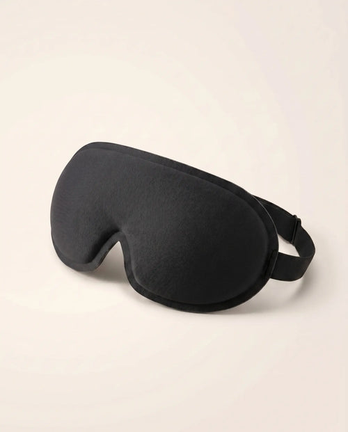Somnia Sable 3D contour sleep mask in Jet black, three-quarter view with adjustable strap