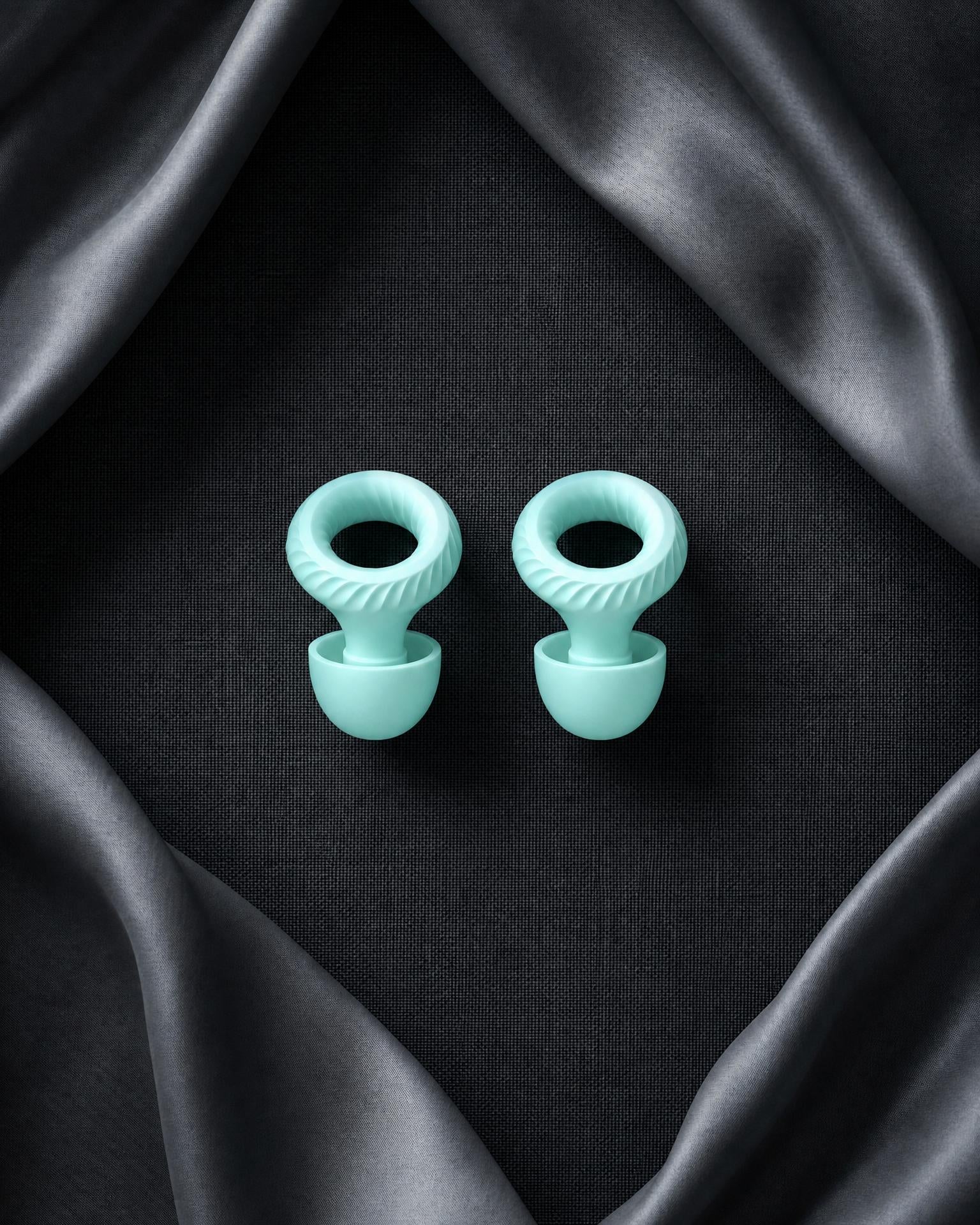 Somnia Mute sound-isolating earplugs in mint green